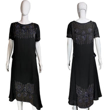 Load image into Gallery viewer, Black dress with intricate detailing on a mannequin against a neutral background