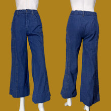 Load image into Gallery viewer, Blue wide-leg denim pants shown on a white mannequin from both front and back views.
