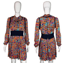 Load image into Gallery viewer, Colorful floral dress on a mannequin against a white background