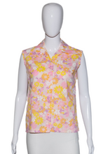 Load image into Gallery viewer, Mannequin wearing a sleeveless floral top and white skirt on a white background
