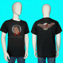 Load image into Gallery viewer, A black short-sleeve graphic T-shirt displayed on a white mannequin from both front and back views. The front features a circular portrait graphic of Wayne Newton with his name printed below in script.