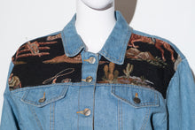 Load image into Gallery viewer, Blue denim jacket with embroidered back on a mannequin against a white background