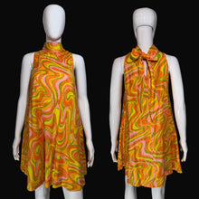 Load image into Gallery viewer, Mannequin wearing a colorful sleeveless dress with a pattern