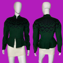 Load image into Gallery viewer, A dark green knit jacket with a black geometric pattern across the yoke and shoulders, displayed on a white mannequin from both front and back views.