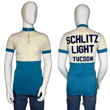 Load image into Gallery viewer, Mannequin wearing a vintage cycling jersey with 'Schlitz Light Tucson' text on a plain background