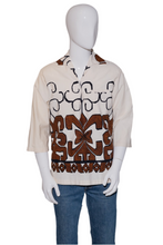 Load image into Gallery viewer, Mannequin wearing a cream shirt with brown geometric pattern on a white background