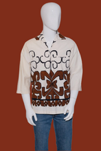 Load image into Gallery viewer, Mannequin wearing a cream shirt with brown geometric pattern on a white background
