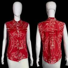 Load image into Gallery viewer, Red sleeveless shirt with white graphic design on mannequins against a white background