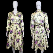 Load image into Gallery viewer, Floral dress on a mannequin with front and back views against a plain background