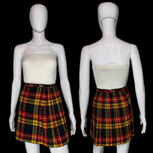 Load image into Gallery viewer, Front and back view of a plaid skirt on a mannequin