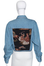 Load image into Gallery viewer, Blue denim jacket with embroidered back design on a mannequin against a white background