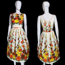 Load image into Gallery viewer, Floral dress on a mannequin against a plain background