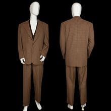 Load image into Gallery viewer, Brown suit displayed on a mannequin against a white wall.