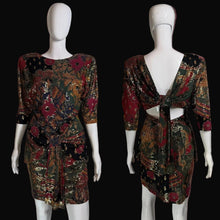 Load image into Gallery viewer, Patterned dress on a mannequin with a plain background.