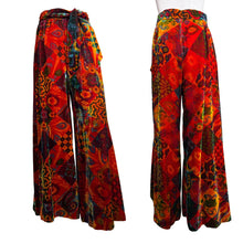 Load image into Gallery viewer, Colorful patterned pants on a mannequin against a white background