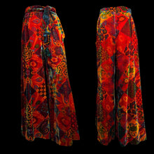Load image into Gallery viewer, Colorful patterned pants on a mannequin against a white background