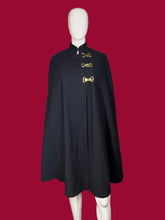 Load image into Gallery viewer, Navy blue cape with gold buckles on a mannequin against a plain background
