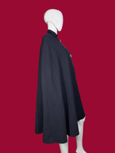 Load image into Gallery viewer, Navy blue cape with gold buckles on a mannequin against a plain background