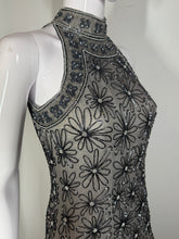 Load image into Gallery viewer, Black beaded dress on a mannequin against a white background
