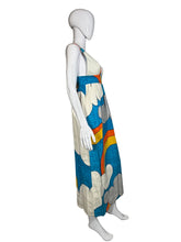 Load image into Gallery viewer, Colorful dress with cloud and rainbow design on a mannequin against a plain wall.
