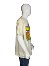 Load image into Gallery viewer, Beige t-shirt with 'The Lion King' graphic on a mannequin against a white background
