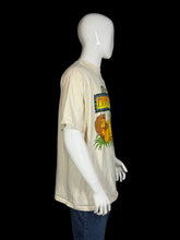 Load image into Gallery viewer, Beige t-shirt with 'The Lion King' graphic on a mannequin against a white background