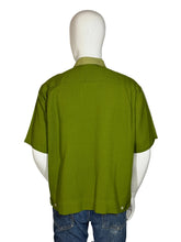 Load image into Gallery viewer, Green shirt on a mannequin with a white background