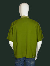 Load image into Gallery viewer, Green shirt on a mannequin with a white background