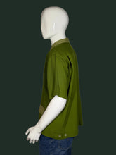Load image into Gallery viewer, Green shirt on a mannequin against a gray background