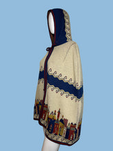 Load image into Gallery viewer, Decorative hooded cape with intricate patterns on a white background