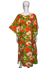 Load image into Gallery viewer, Floral patterned fabric on a mannequin against a plain background