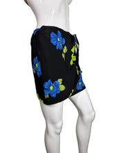Load image into Gallery viewer, Black skirt with blue and green floral pattern on a mannequin against a plain background