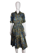 Load image into Gallery viewer, Floral dress on a mannequin against a white background