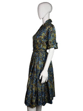 Load image into Gallery viewer, Mannequin wearing a floral dress on a plain background