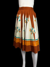 Load image into Gallery viewer, Dress with floral pattern on a mannequin against a plain background