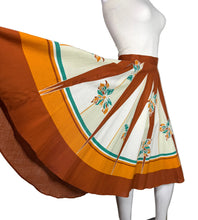 Load image into Gallery viewer, Skirt with a floral pattern on a mannequin against a plain background