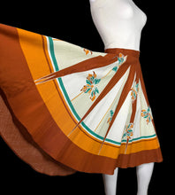 Load image into Gallery viewer, Skirt with a floral pattern on a mannequin against a plain background