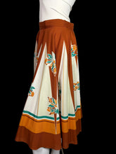 Load image into Gallery viewer, Skirt with a floral pattern on a mannequin against a plain background