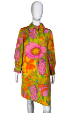 Load image into Gallery viewer, Colorful floral-patterned fabric on a white mannequin against a plain background