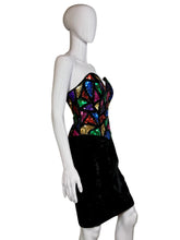 Load image into Gallery viewer, Mannequin wearing a black dress with colorful geometric patterns on a white background
