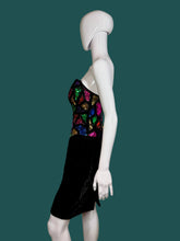 Load image into Gallery viewer, Black dress with colorful sequin top on a mannequin against a plain background