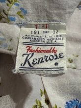 Load image into Gallery viewer, Close-up of a label