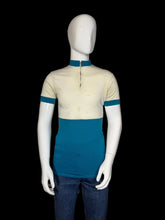 Load image into Gallery viewer, Mannequin wearing a vintage cycling jersey with 'Schlitz Light Tucson' text on a plain background