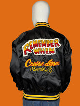 Load image into Gallery viewer, Black jacket with colorful text on a mannequin against a white background