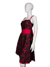 Load image into Gallery viewer, Mannequin wearing a red and black floral dress on a white background
