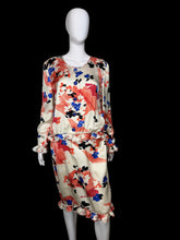 Load image into Gallery viewer, Floral dress on a mannequin against a plain background