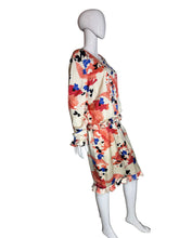 Load image into Gallery viewer, Floral dress on a mannequin against a white wall