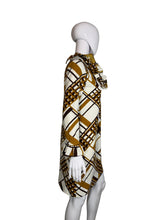 Load image into Gallery viewer, Mannequin wearing a patterned outfit on a plain background