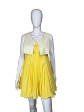 Load image into Gallery viewer, Mannequin wearing a yellow pleated dress on a plain background