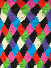 Load image into Gallery viewer, Multicolored woven pattern with black, red, green, blue, and purple colors.